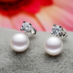 Round Pearl Stud Earrings with Silver-Plated Design