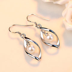 Twisted Pearl Earrings with Tassel Design