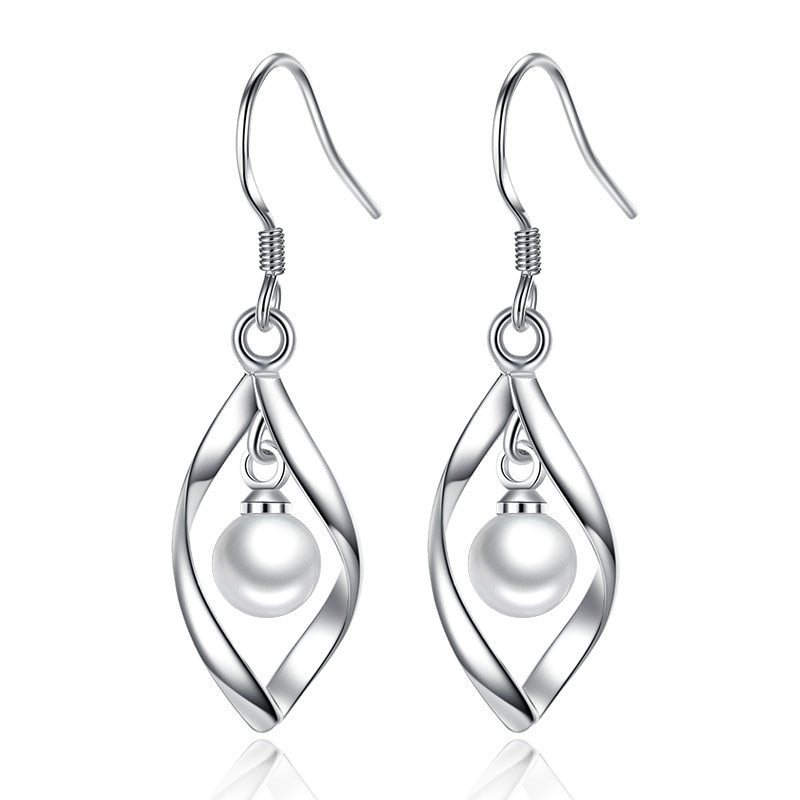 Twisted Pearl Earrings with Tassel Design